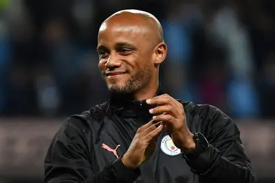 Kompany hangs up boots to become Anderlecht manager